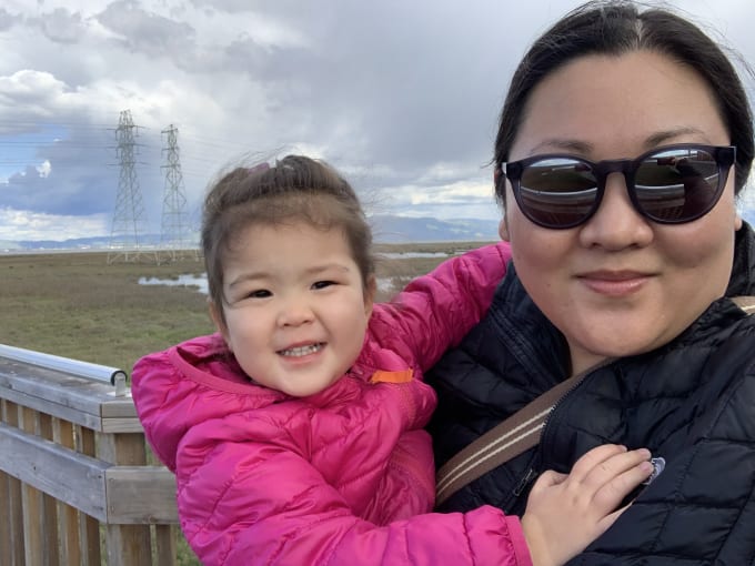 Katie and her daughter on a walk.