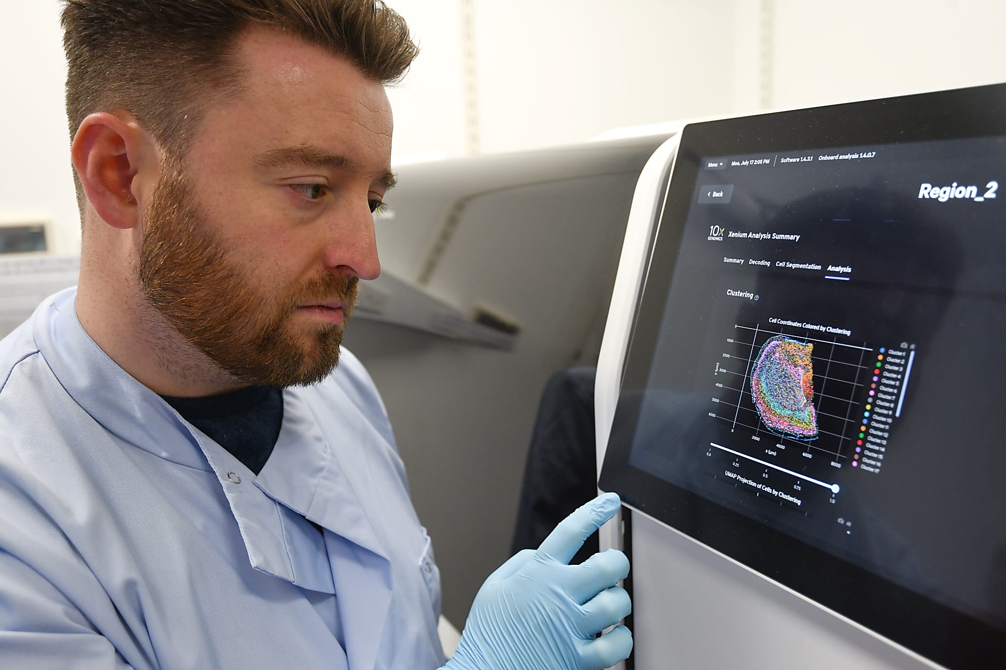 Dr. Kenny Roberts, shown reviewing an experiment on the Xenium Analyzer. Image Credit: Greg Moss / Wellcome Sanger Institute.