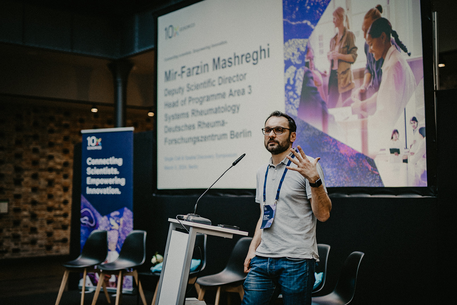 Mir-Farzin Mashreghi, PhD, presenting research at the 10x Genomics Single Cell & Spatial Discovery Symposium in Berlin.